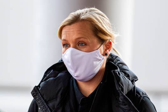 Jayne Ludlow, head coach of Wales, arrives wearing a face mask ahead of the UEFA Women's Euro Qualifier football match between Norway and Wales on September 22, 2020 in Oslo.