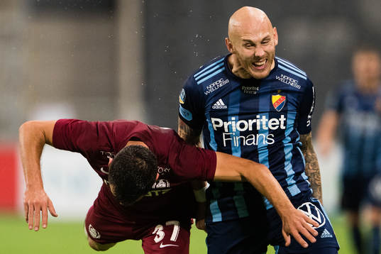 Mihai Bordeianu of CFR Cluj and Magnus Eriksson of Djurgården