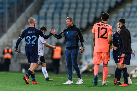 Jo Inge Berget and Jon Dahl Tomasson, head coach  of Malmö FF celebrates