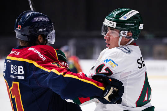 Djurgårdens Dick Axelsson och Frölundas Daniel Torgersson