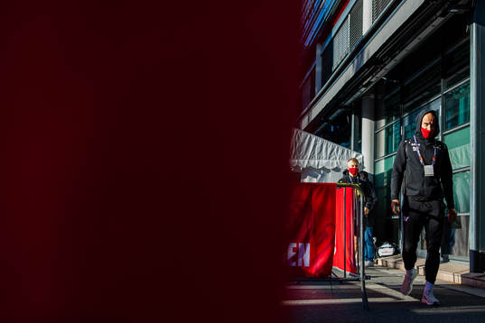 Tore Reginiussen arrives wearing a face mask