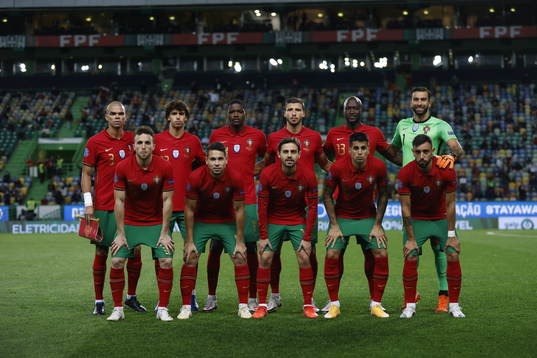 The starting eleven of Portugal pose for a team photo