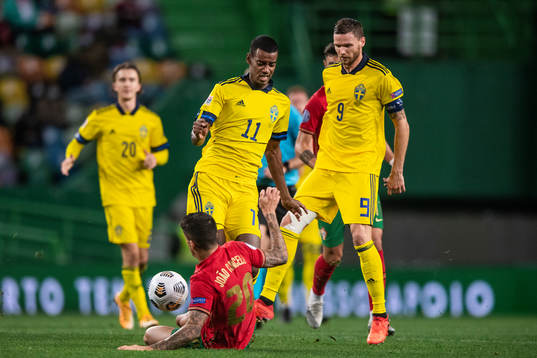 Joao Cancelo of Portugal against Alexander Isak