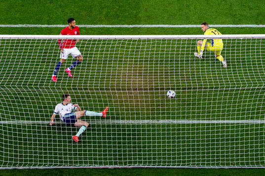 Tom Flanagan of Northern Ireland saves an attempt