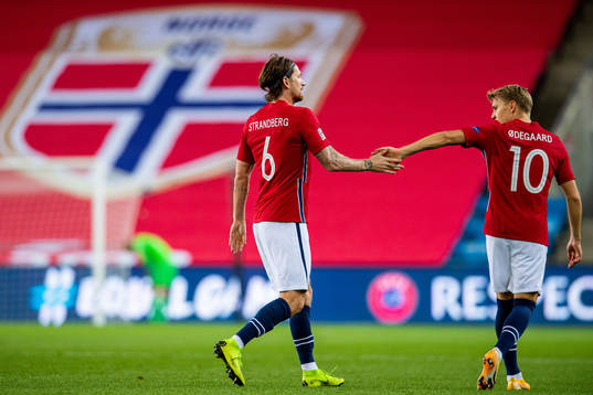 Stefan Strandberg of Norway celebrates with teammate Martin