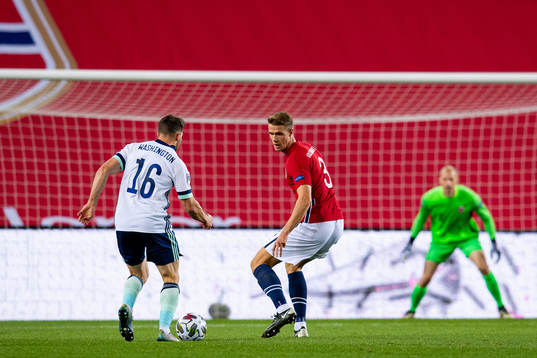 Conor Washington of Northern Ireland and Kristoffer Ajer of