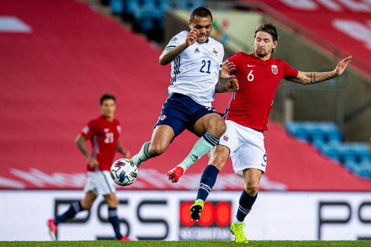 Josh Magennis of Northern Ireland and Stefan Strandberg of