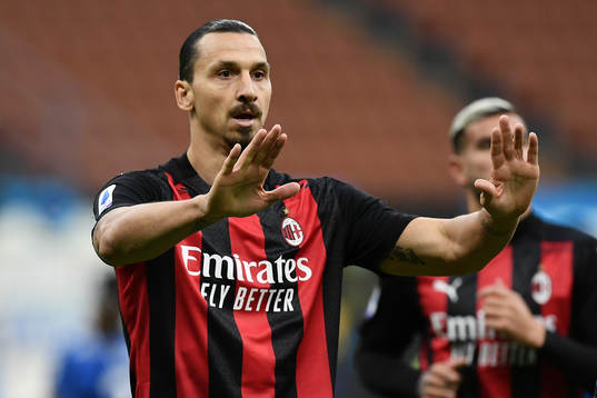 Zlatan Ibrahimovic of Milan celebrates scoring his second
