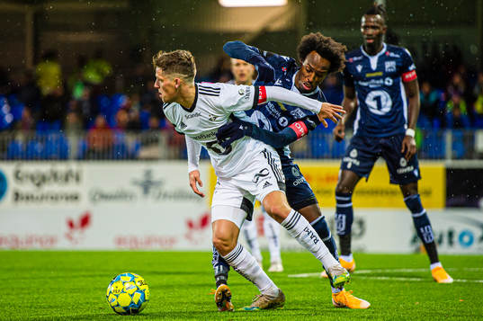 Carl Johan Holse Justesen of Rosenborg and Amin Soleiman