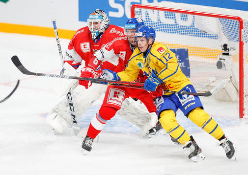 Max Friberg #12, SWE, Jakub Jerabek #5, CZE and goalie