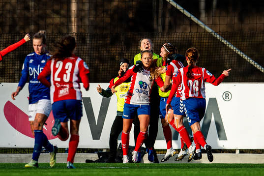 Camilla Linberg of Lyn celebrates with teammates after scoring 1-1