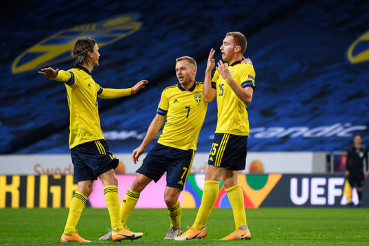 Kristoffer Olsson , Sebastian Larsson and Dejan Kulusevski of Sweden celebrate the 1-0 goal