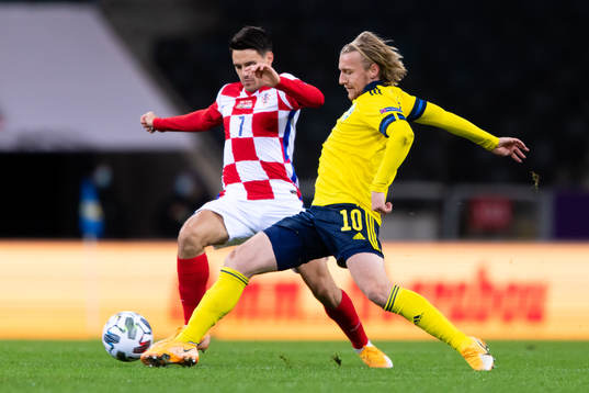 Josip Brekalo of Croatia and Emil Forsberg of Sweden