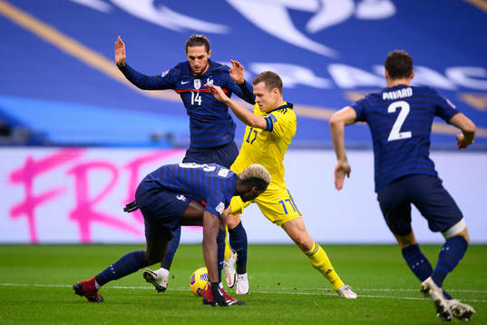 Viktor Claesson of Sweden against Adrien Rabiot  and Paul