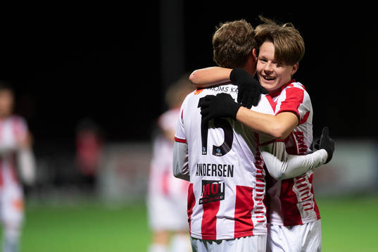 Magnus Andersen and August Mikkelsen of Tromsø celebrate