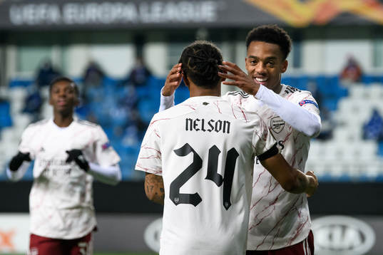 Reiss Nelson and Joe Willock of Arsenal celebrate the 0-2 goal