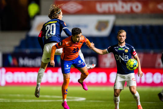 Mikkel Maigaard Jakobsen of Strømsgodset and Niklas Fernando Nygaard Castro of Aalesund