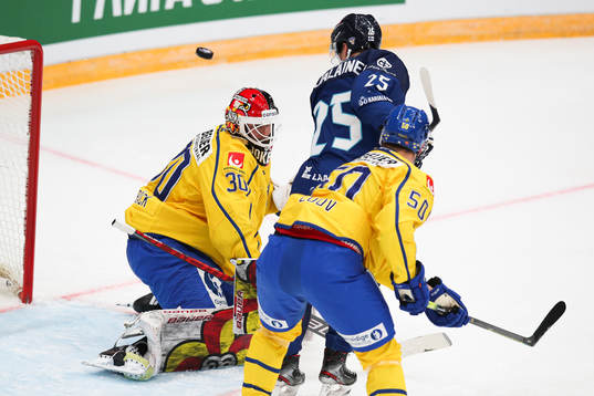 goalkeeper Anders Lindbäck of Sweden, Jere Karjalainen of