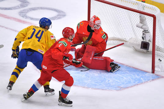 Arvid Costmar of Sweden scores to tie the game 1-1