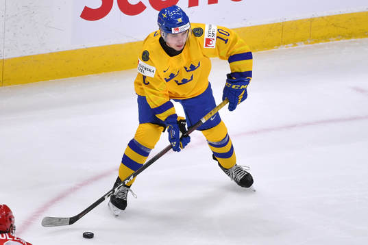 Alexander Holtz of Sweden prepares to make a pass