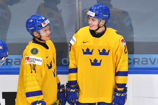 Arvid Costmar and Noel Gunler of Sweden have a discussion