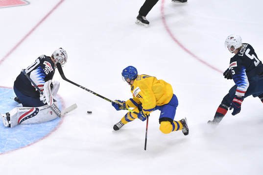 Arvid Costmar of Sweden is hooked by Jackson LaCombe of USA