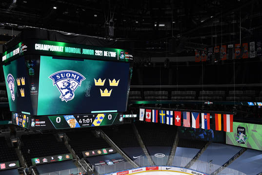 The score clock at Rogers Place displays the logos of both