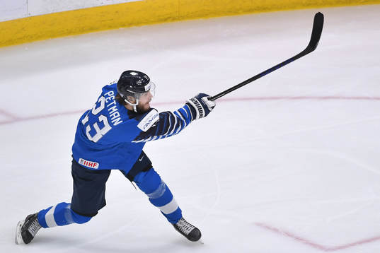 Mikko Petman of Finland shoots the puck