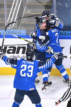 Roni Hirvonen of Finland celebrates the game winning goal