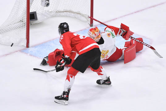 Yaroslav Askarov of Russia makes a save