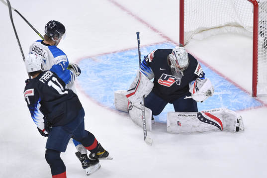 Spencer Knight of USA makes a save