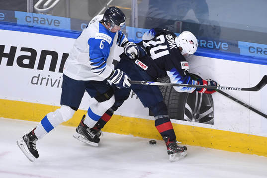 Eemil Viro of Finland collides with Bobby Brink of USA