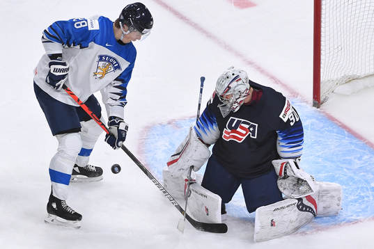 Spencer Knight of USA makes a save