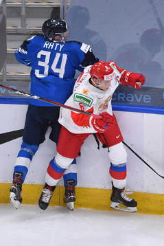 Semyon Chistyakov of Russia collides with Aku Raty of