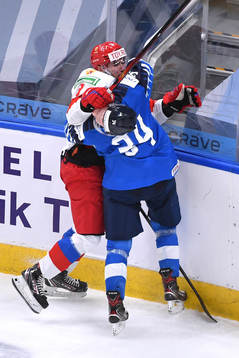 Artemi Knyazev of Russia collides with Aku Raty of Finland