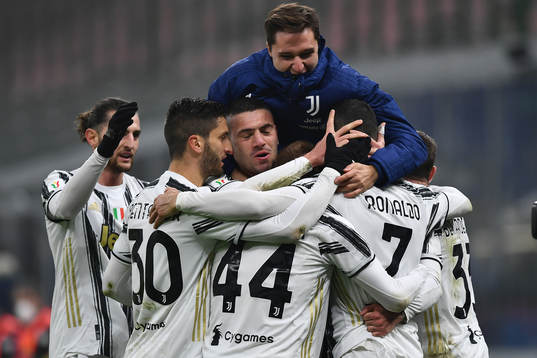 Cristiano Ronaldo celebrate with Dejan Kulusevski of Juventus and teammates during the Coppa Italia Semifinal football match on February 2, 2021 in Milano . 
