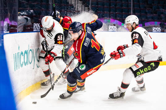 Djurgårdens Tom Wandell och Malmö Redhawks Eric Engstrand