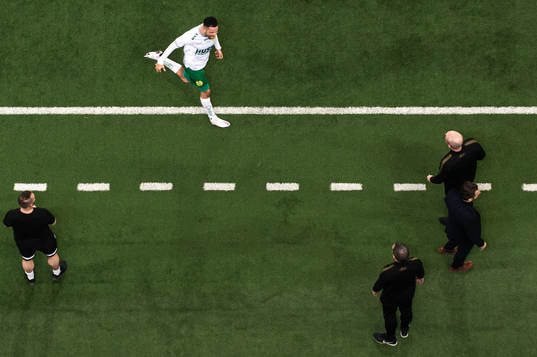 s bänk och tränare Bartosz Grzelak samt assisterande tränare Andreas Janmyr under fotbollsmatchen i Svenska Cupen mellan Hammarby och AIK den 7 mars 2021 i Stockholm. 