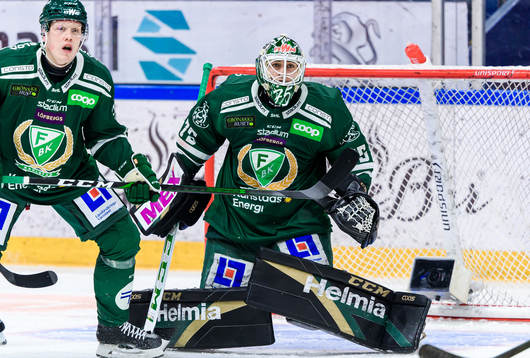 Färjestads Niclas Lundgren och målvakt Arvid Holm