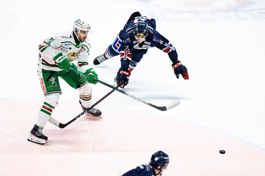 Rögles Mattias Sjögren och Linköpings Mattias Bäckman