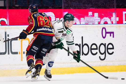 Djurgårdens Manuel Ågren och Färjestads Oskar Bäck