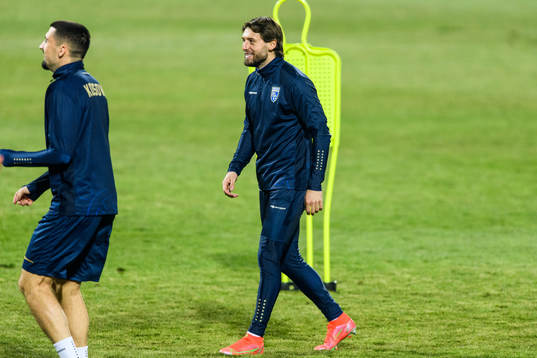 Arber Zeneli of the Kosovo national football team warm up