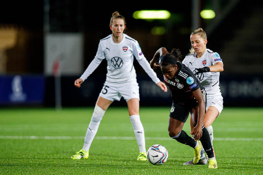 Viviane Asseyi of Bayern Munich and Jelena Cankovic of