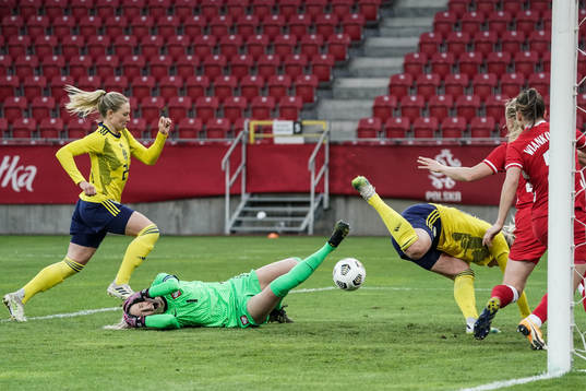 goalkeeper Katarzyna Kiedrzynek of Poland is in pain
