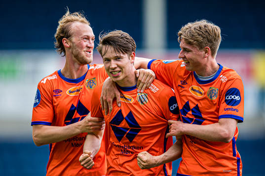 Kristoffer Ødemarksbakken of Aalesund celebrates with Jørgen Hatlehol and Oscar Solnørdal after scoring the 1-0 goal