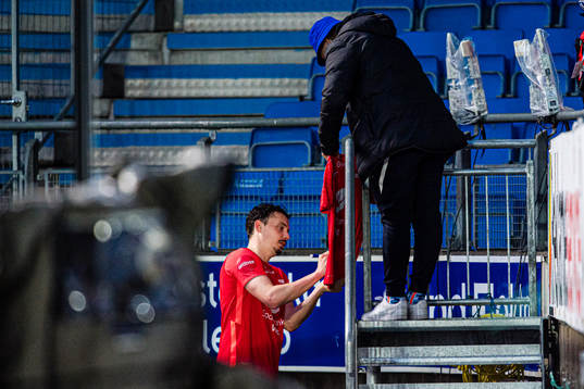 Vegard Valgermo Forren of Brann signing a shirt