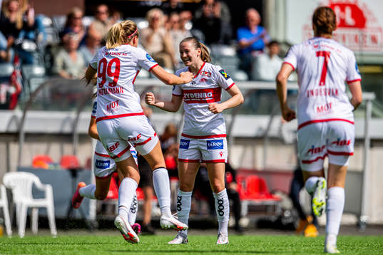 Elisabeth Terland of Sandviken celebrates with teammate Maria Dybwad Brochmann after scoring 1-0