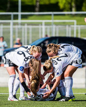 Cesilie Andreassen of Rosenborg (on the ground) celebrates after scoring the 2-0 goal