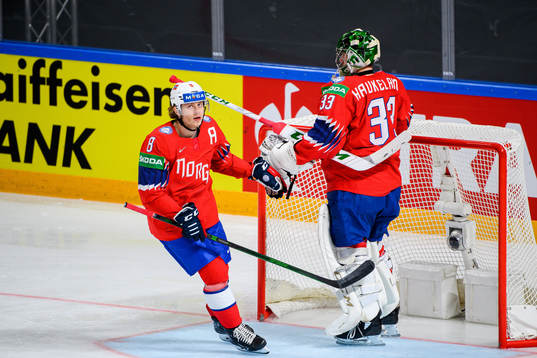 Mathias Trettenes and goalkeeper Henrik Haukeland of Norway