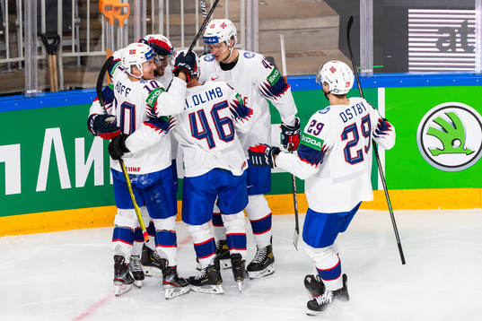 Mats Rosseli Olsen of Norway celebrates with team mates